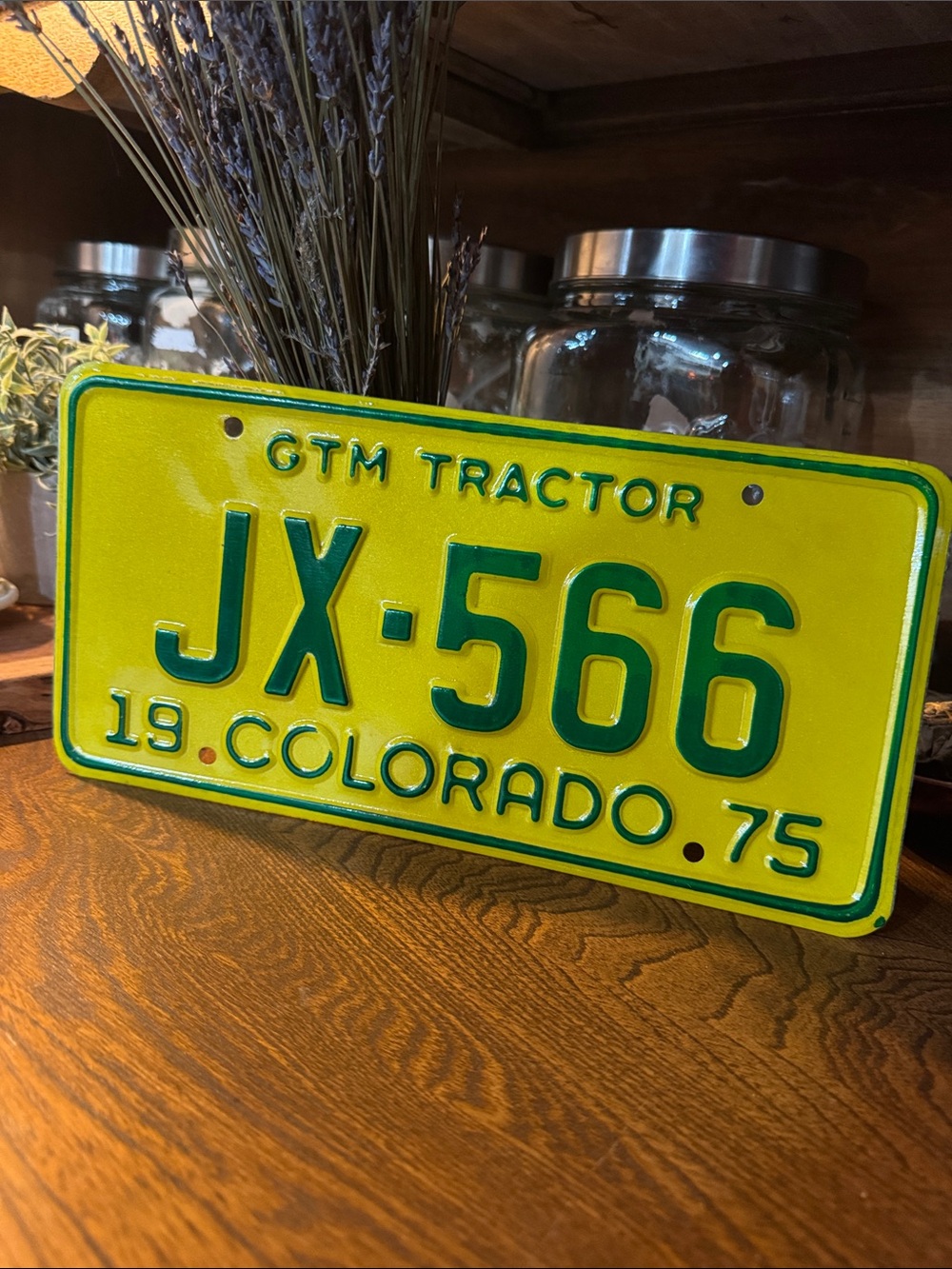 Vintage 1975 Colorado Steel GTM Tractor License Plate JX-566 - Yellow and Green